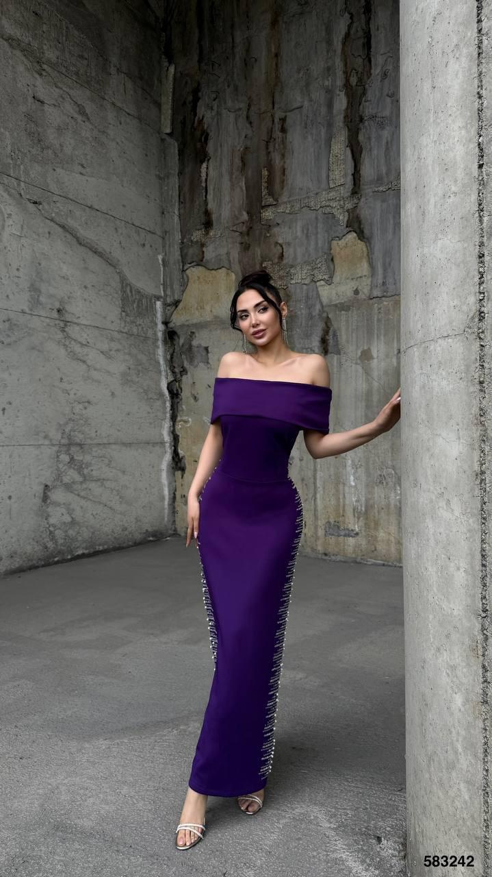 Evening dress with open shoulders and rhinestones